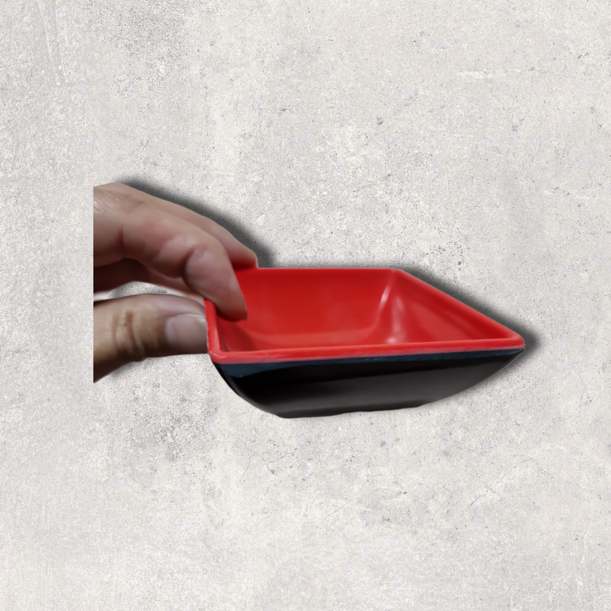 röd liten plast såsfat